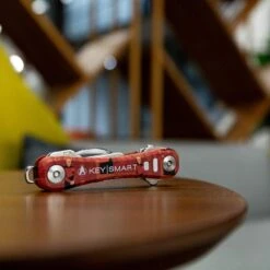 KeySmart Pro Star Trek The Next Generation Compact Key Holder With Tile Smart Location -Multifunctional Tool Store KS411TRKJLP KeySmart Pro Star Trek Picard on Side Table