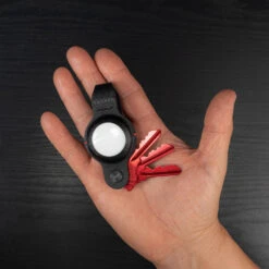 KeySmart Air Compact 2-in-1 AirTag And Key Holder 13 KeySmart Air Compact 2-in-1 AirTag And Key Holder -Multifunctional Tool Store KeySmartAir Blk AirKeys Red Lifesltyle Inhand Open 2000x2000 2000x 0f10aed9 066b 406c afd4 2794d3bac8dc